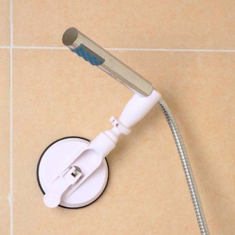 Soporte para el grifo de ducha con ventosa en uso